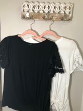 Load image into Gallery viewer, White or Black t-shirt with lace sleeve detail with front knot.
